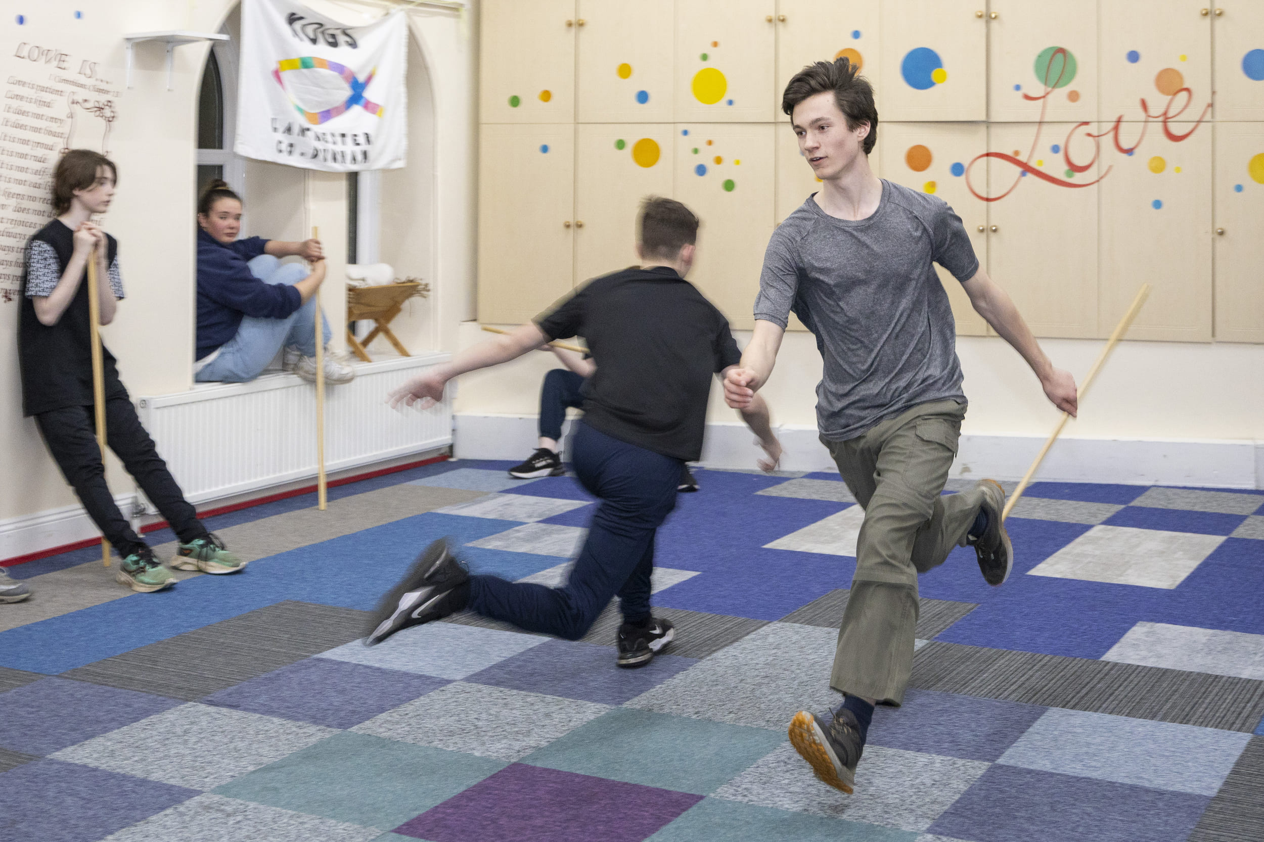 Young people playing an active game at KoGs Youth Club in Lanchester.