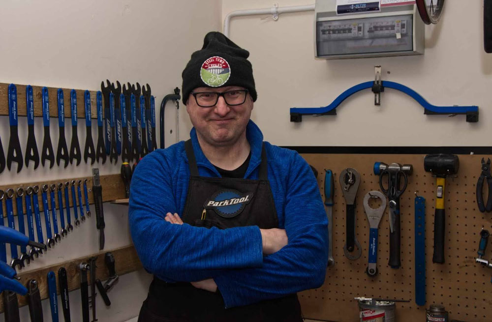 3. Keeping the people peddling. Jonathan from Steeltown Cycles was very busy during the first Lockdown, when people went to get their bikes out of the garage or the shed to do their daily exercise, only to find they needed quite a lot of attention. (Image: Chris Bruce)