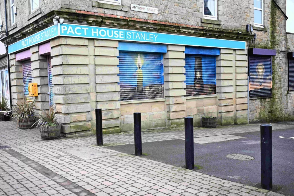 Stanley Front Street Brightened with Community-Inspired Shop Shutter Art