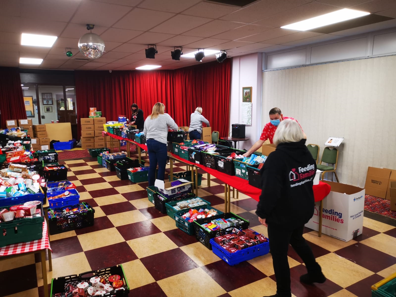 Charity Distributes Food Parcels To Families This Christmas