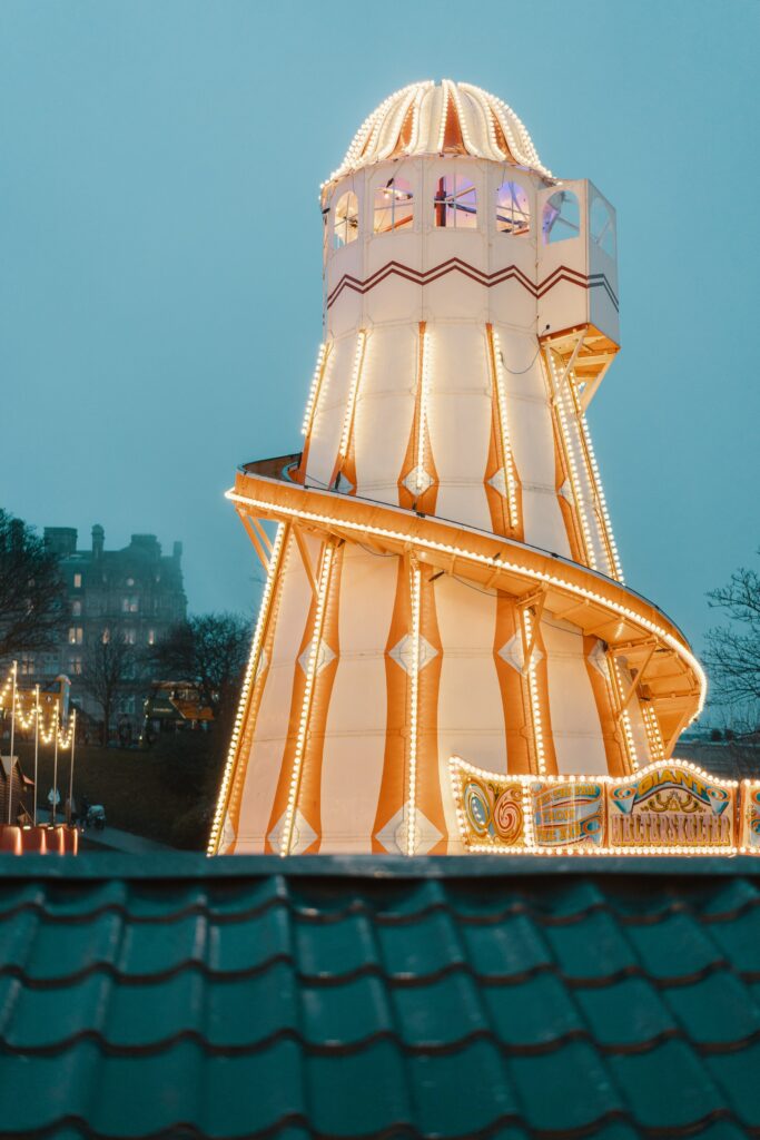 2018 Helter Skelter in Edinburgh Christmas Market Stalls Photo by Ross Sneddon on Unsplash