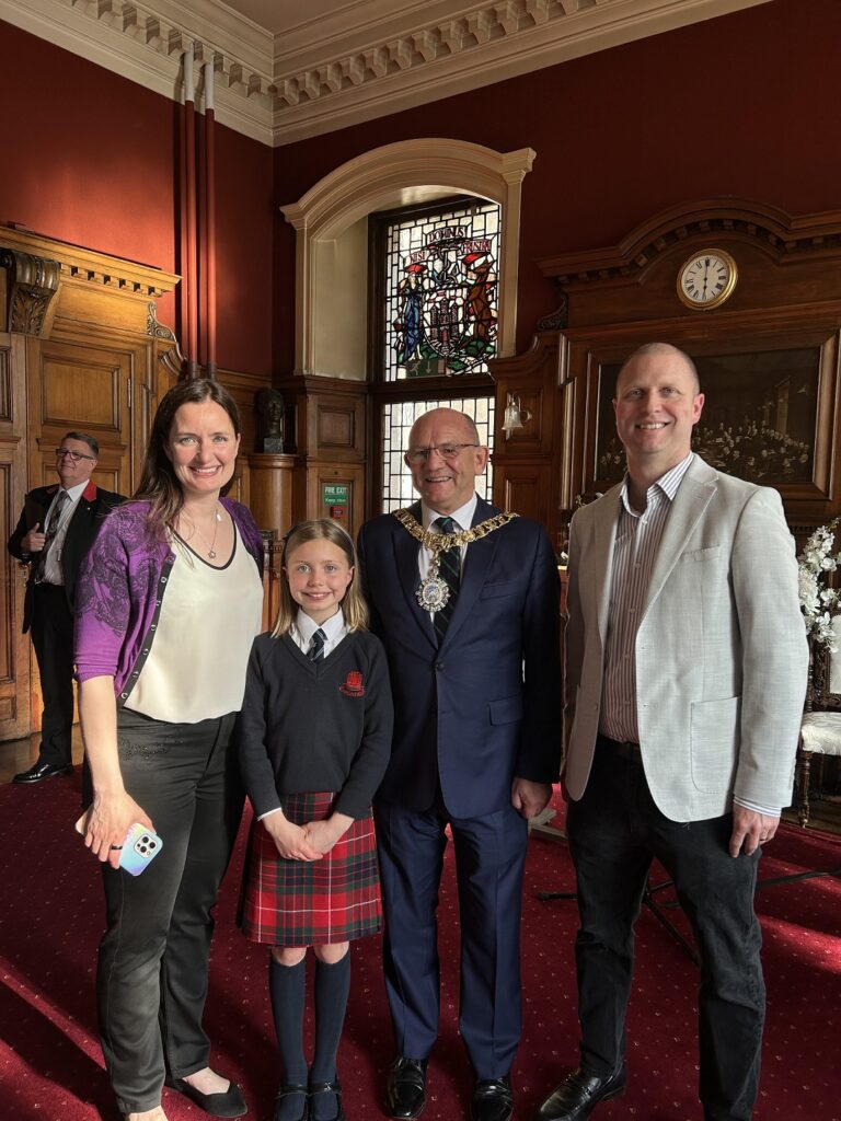 Lord Provost with overall Green Pencil Award winner Ema Mene and her family