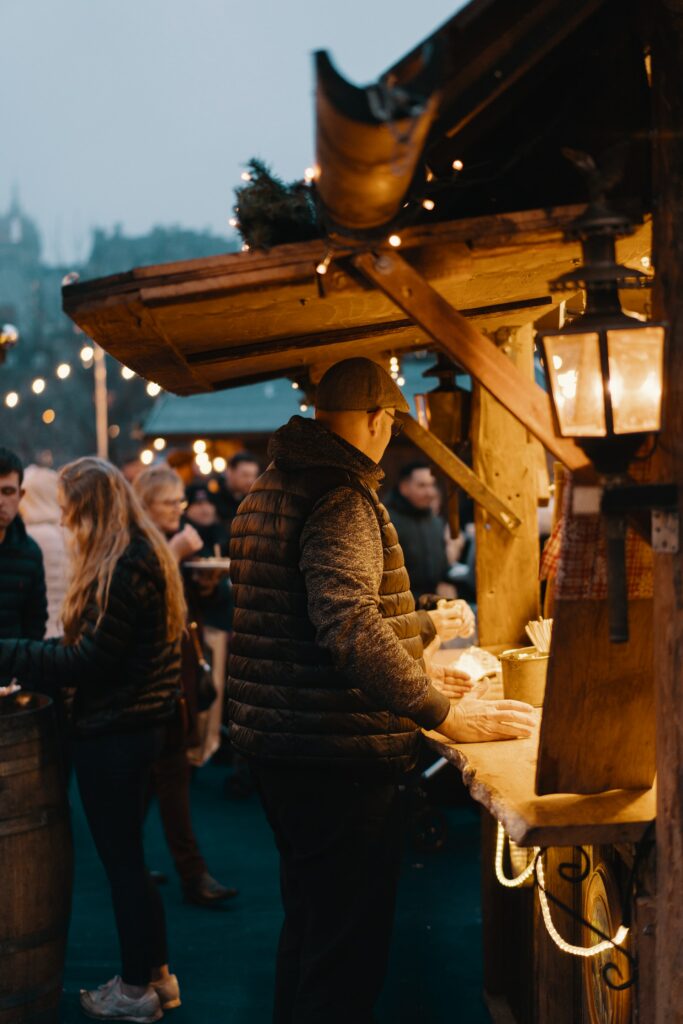 Enjoying the stalls at the 2018 Edinburgh Christmas Market Stalls Photo by Ross Sneddon on Unsplash People Enjoying the stalls at the 2018 Edinburgh Christmas Market Stalls Photo by Ross Sneddon on Unsplash