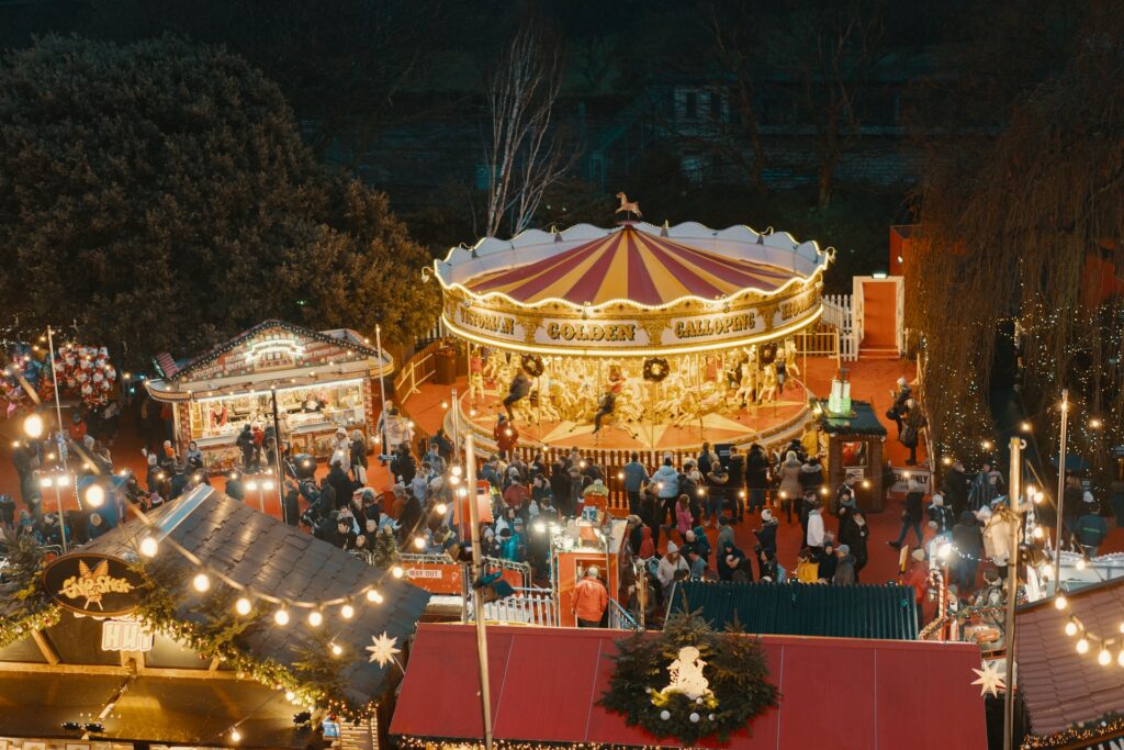 2018 Merry Go Round in Edinburgh Christmas Market Stalls Photo by Ross Sneddon on Unsplash