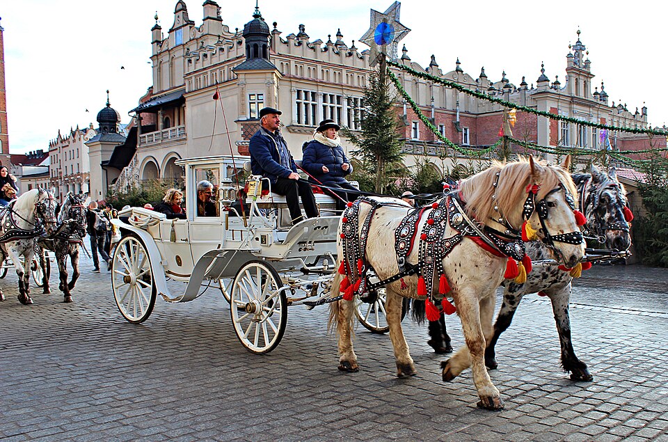 Krakow Old Town People Riding a Horse Carriage