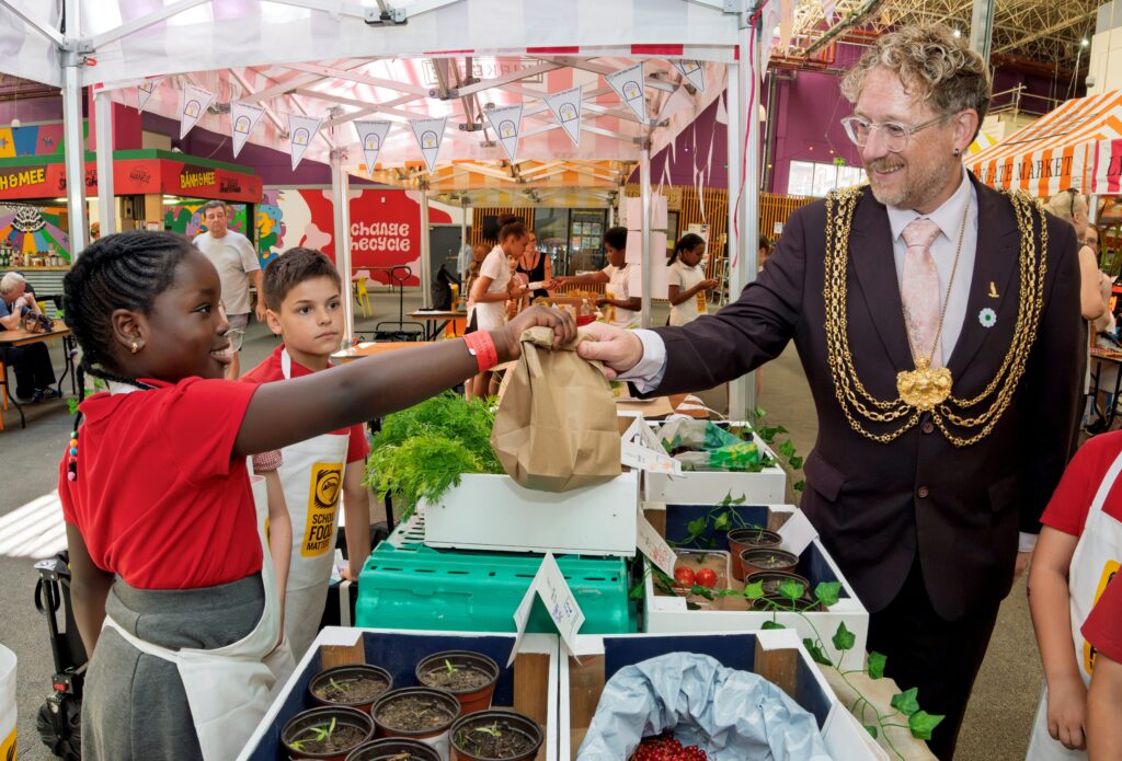 Leeds Schoolchildren Sell Home-Grown Produce at Kirkgate Market
