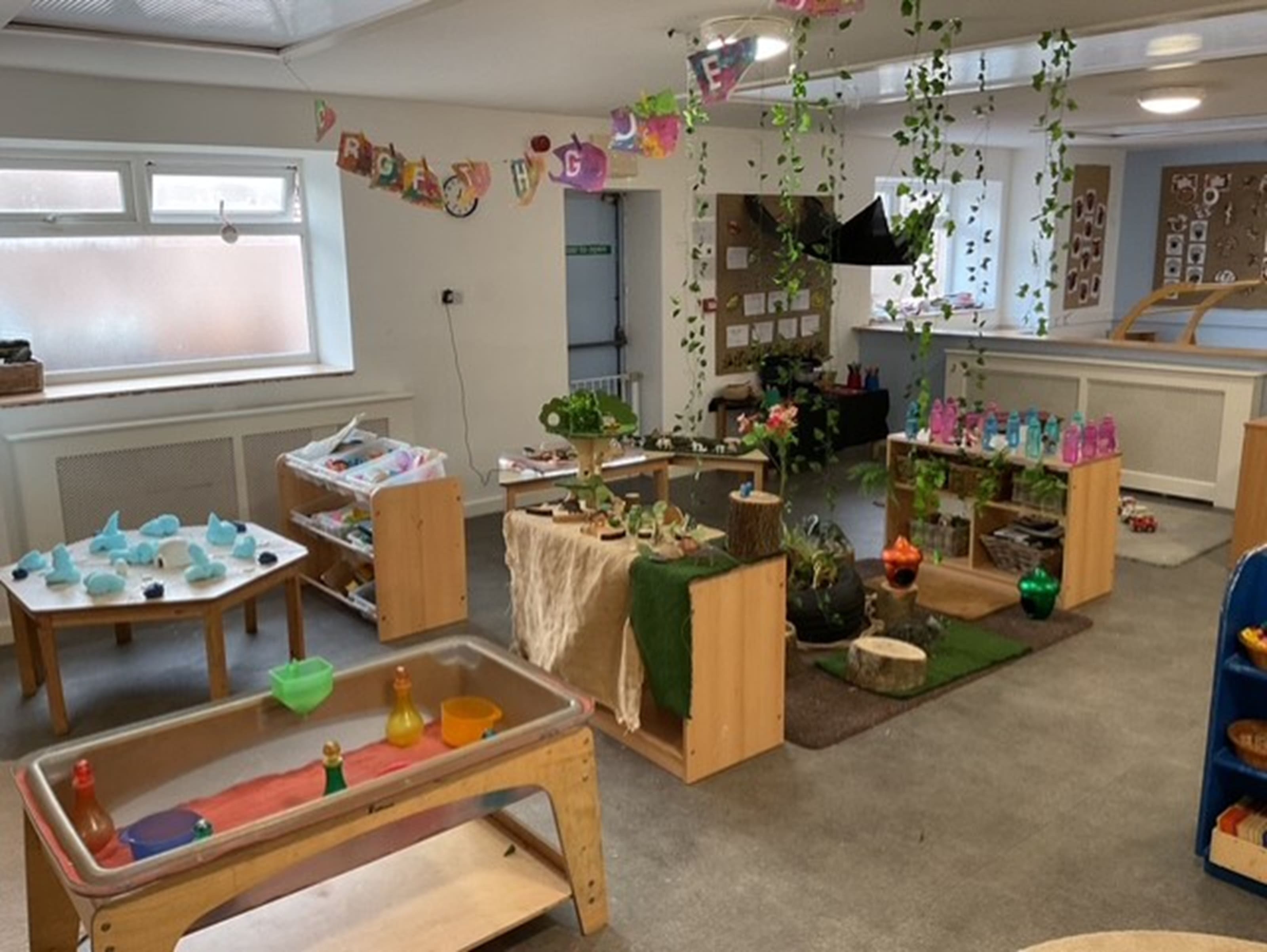 An indoor learning space at Little Faces Nursery, designed to support child-led play and early development through natural materials and open-ended activities.