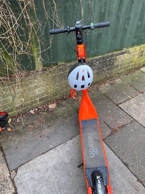neuron e-scooters with helmet