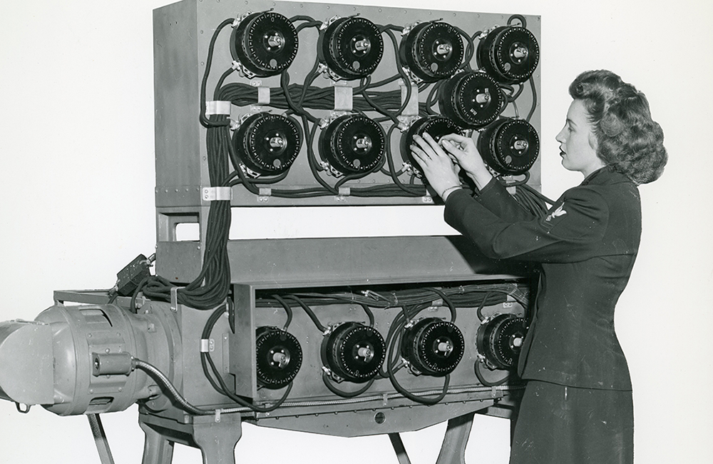 Cipher_Girls: An image of a woman decoding.