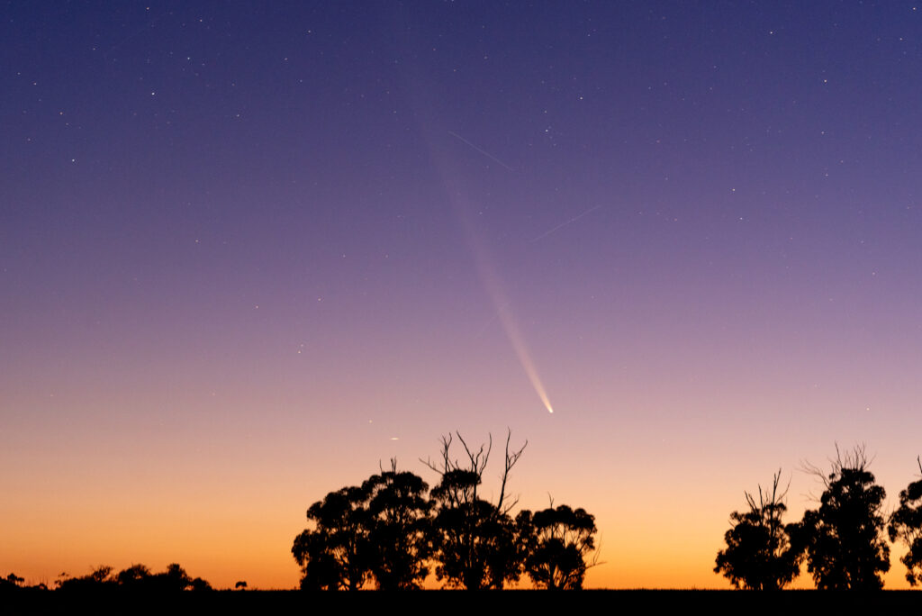 Comet C/2023 A3 Tsuchinshan-ATLAS captured glowing in the night sky.